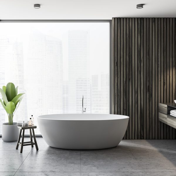 Modern bathroom interior with dark wooden walls, gray floor, white bathtub and double sink. Panoramic window. 3d rendering